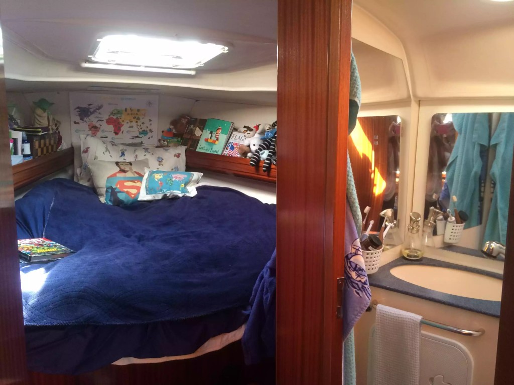 Carson's room is the v-berth where he has his own private head and lots of space for his books and toys.