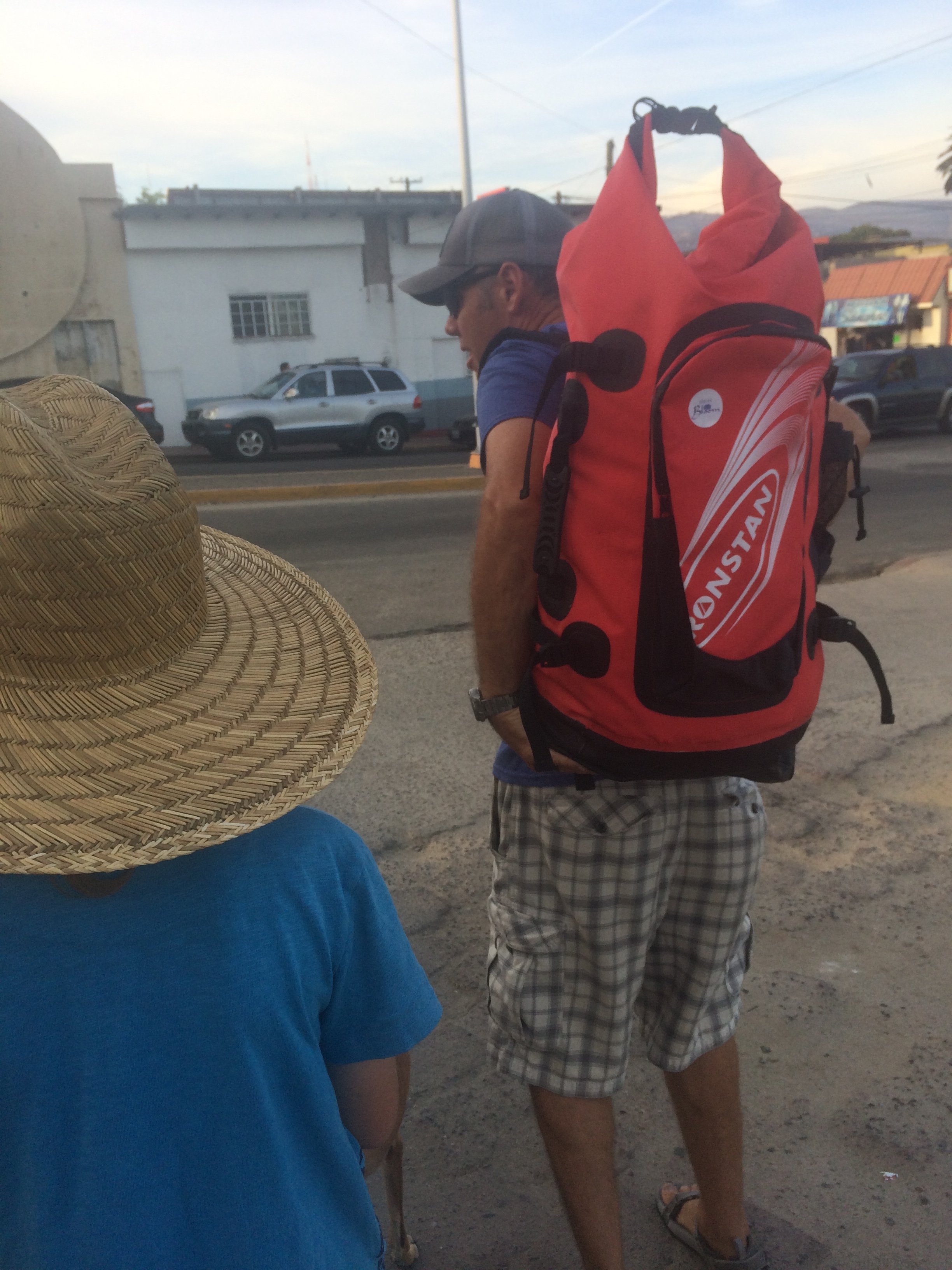 Walking the laundry to the laundromat. $110 pesos for a full service load- wash, dry and fold! AWESOME.